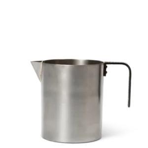 Obra Milk Jug in stainless steel with black handle and brass rivets