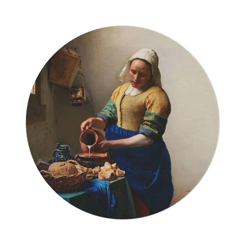 The Milkmaid by Johannes Vermeer round mat, overhead view on white background